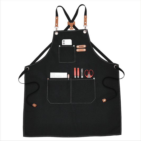 Black MEEDEN painting apron with pockets, worn by a model