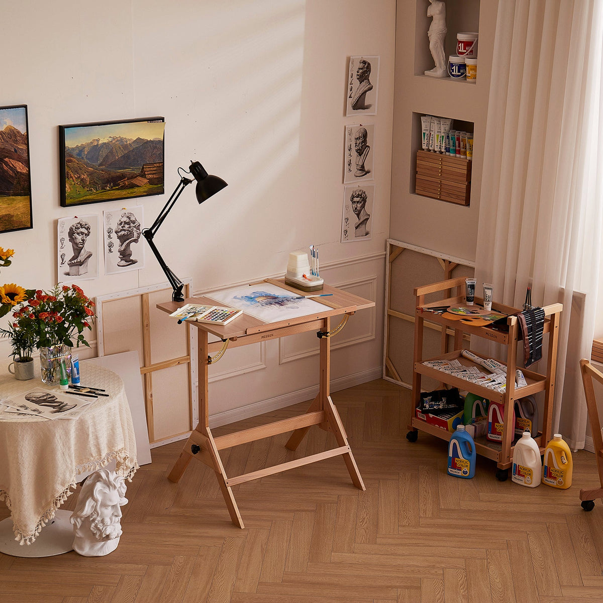 MEEDEN adjustable beech drafting table in a bright art studio